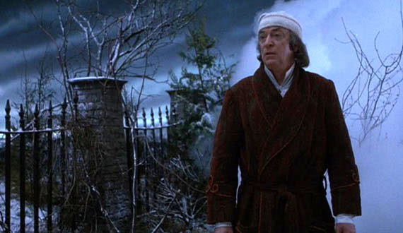 Scrooge looks over a lonely cemetery on next Christmas Eve.