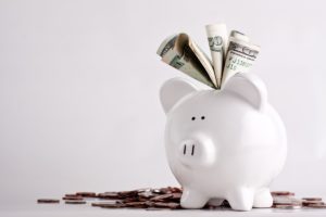 A piggy bank stuffed with money